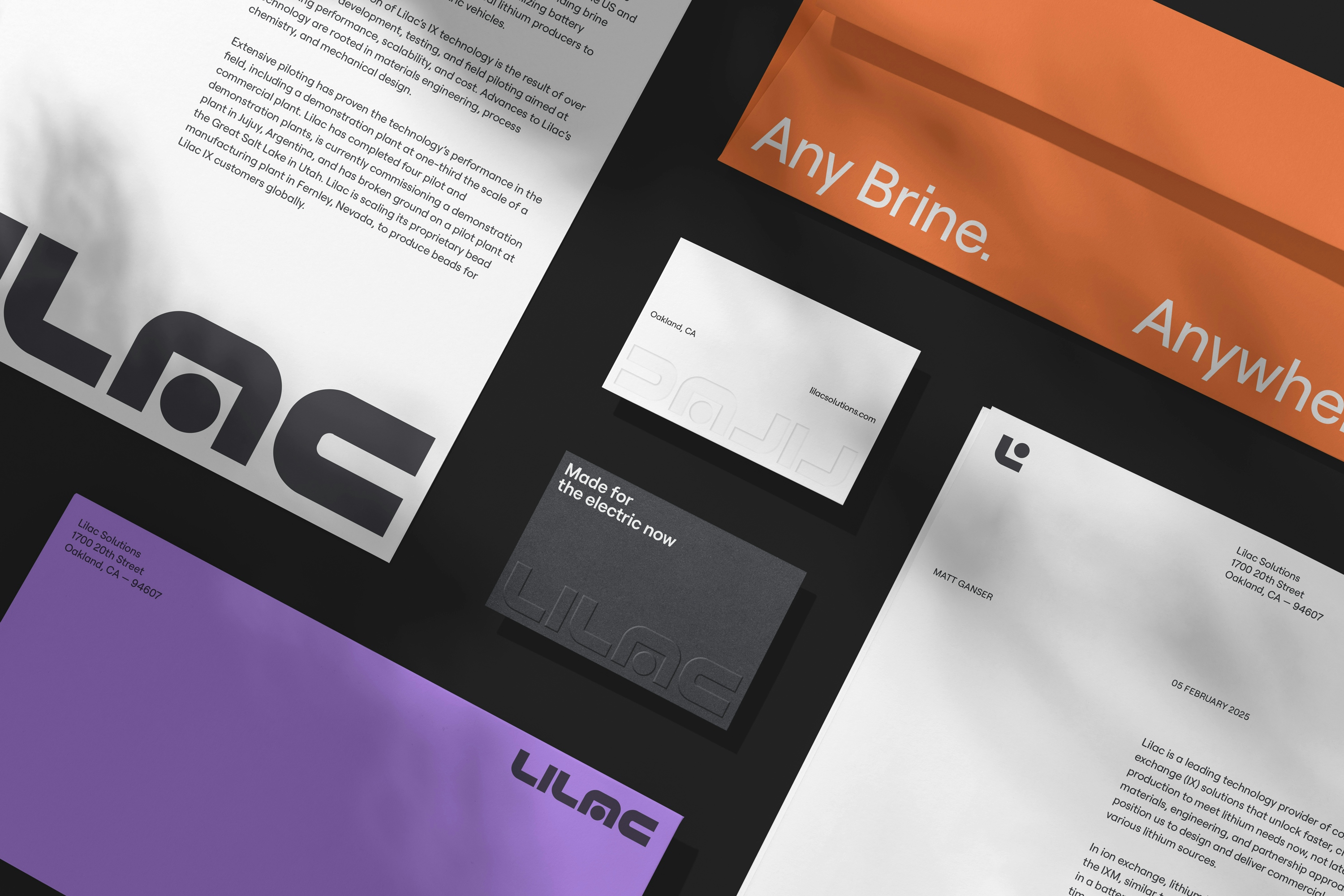 Lilac stationery including letterhead, envelopes, and business cards
